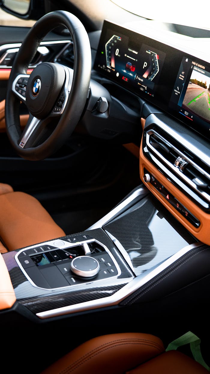 High-end BMW interior featuring leather seats and modern dashboard in İzmir, Türkiye.